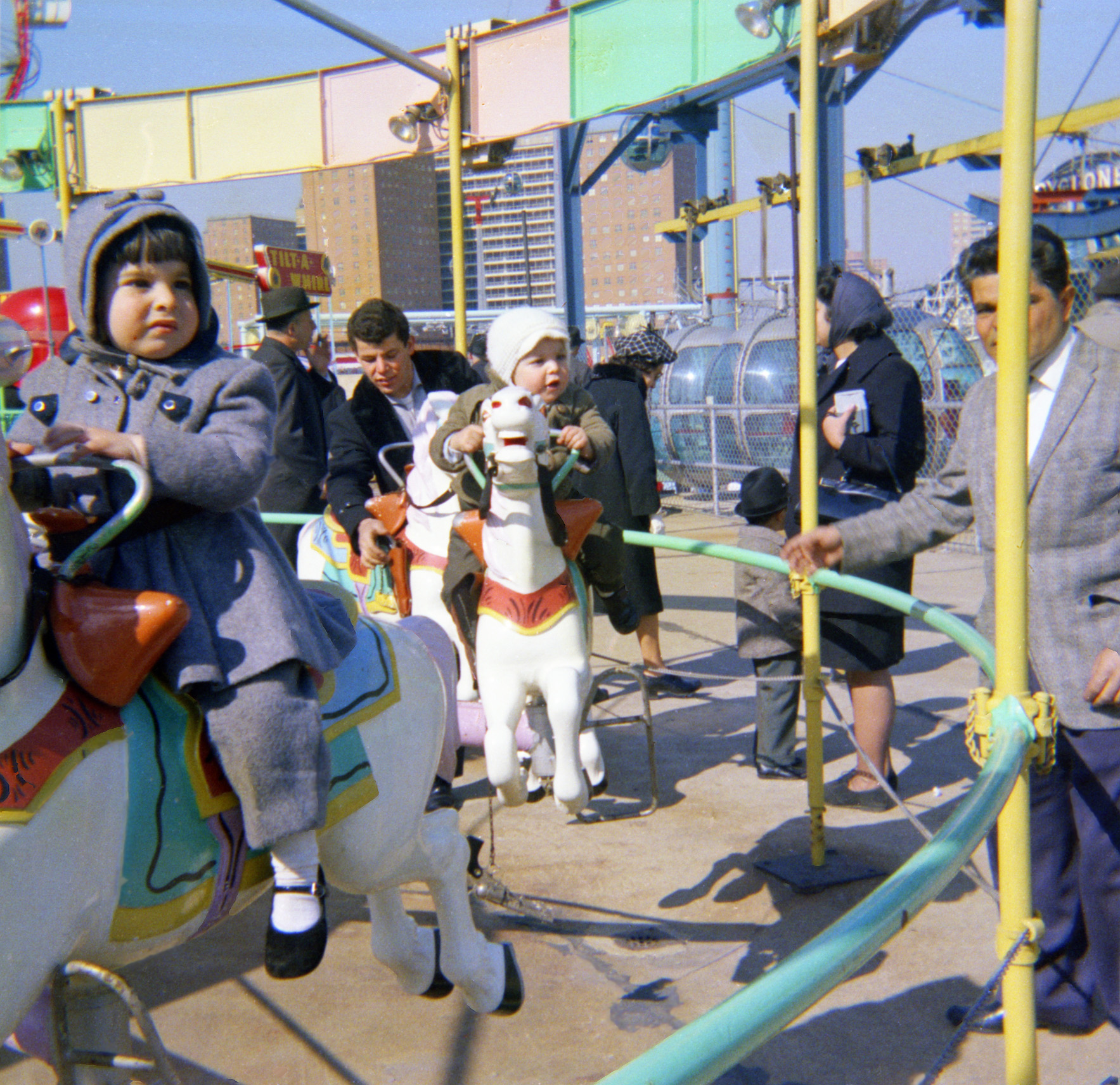 On the Merry-go-round at Coney Island, New York, in 1963. View full size.