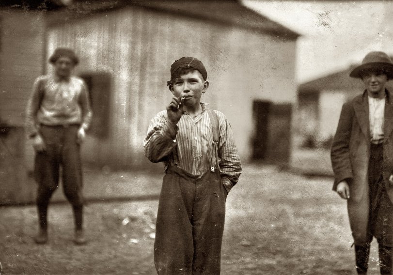 John Tidwell, doffer in Avondale Mills. Birmingham, Alabama. November 1910. View full size. Photograph and caption by Lewis Wickes Hine.