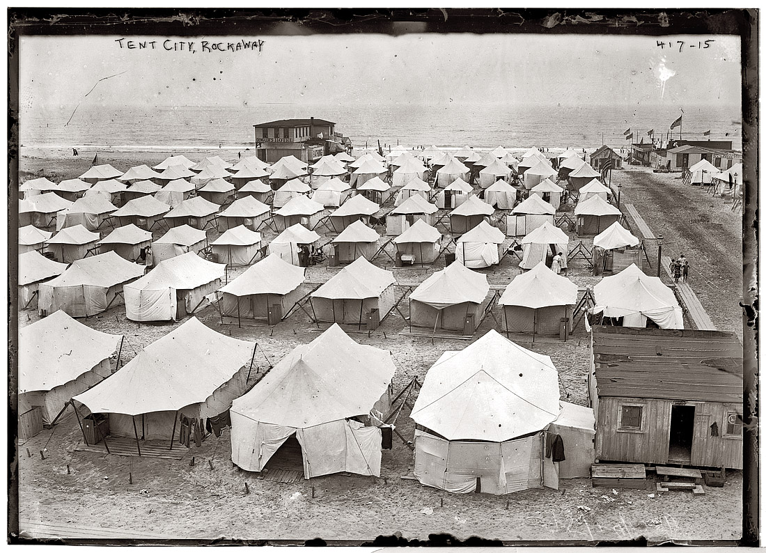 July 26, 1910. Tent city on the beach at Rockaway, Queens. View full size. 5x7 glass plate negative, George Grantham Bain Collection.