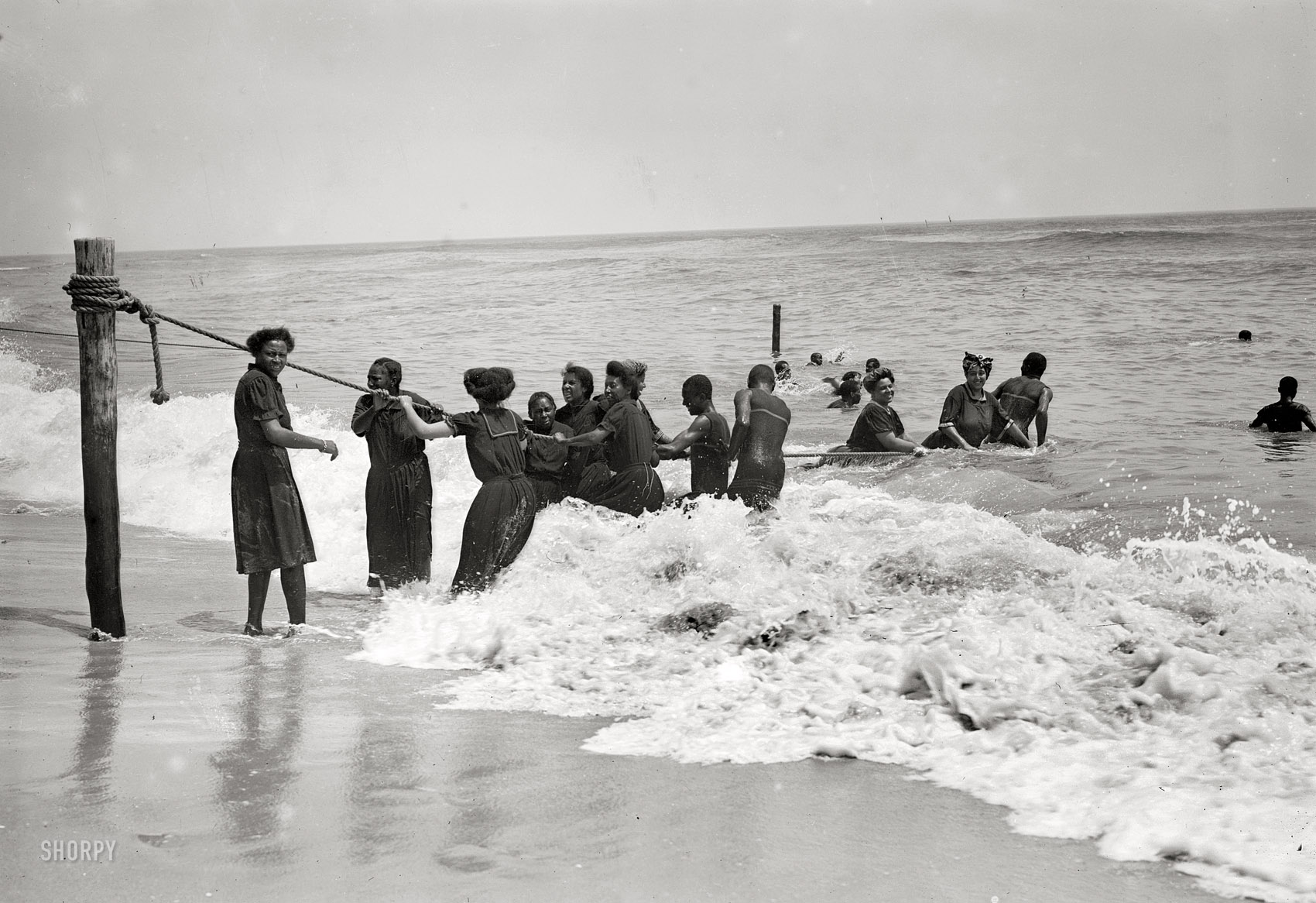 July 19, 1908. "Negro bathers, Asbury Park." A frolic in the New Jersey surf. 5x7 glass negative, George Grantham Bain Collection. View full size.