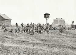 November 1864. Aiken's Landing, Virginia. "Army of the James. Convalescent colored troops at Aiken's Landing. A.M. Aiken's house at right." View full size.