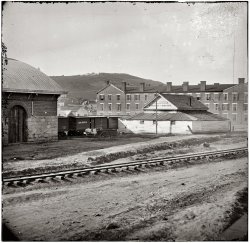 1864. "Chattanooga, Tennessee. Adams Express office and the Crutchfield house with Cameron Hill in the distance." Photographer unknown. View full size.