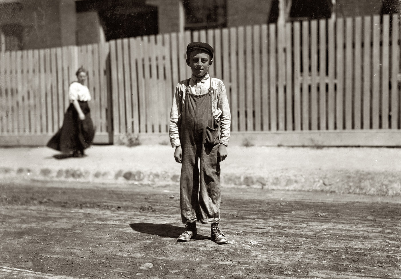 August 1911. New Bedford, Massachusetts. "John Bachman, 22 Nelson Street, Ward 6. Works in drawing-in room at Acushnet Mill. 14 years old." Photograph by Lewis Wickes Hine. View full size.