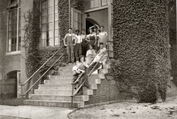 August 1911. New Bedford, Massachusetts. "A group of workers in the Butler Mills. Kate McCormick, 10 Cleveland Street, the smallest girl in the picture, apparently 13 years old. The happy faces appear only when the photo is being taken." Photo and caption by Lewis Wickes Hine. View full size.