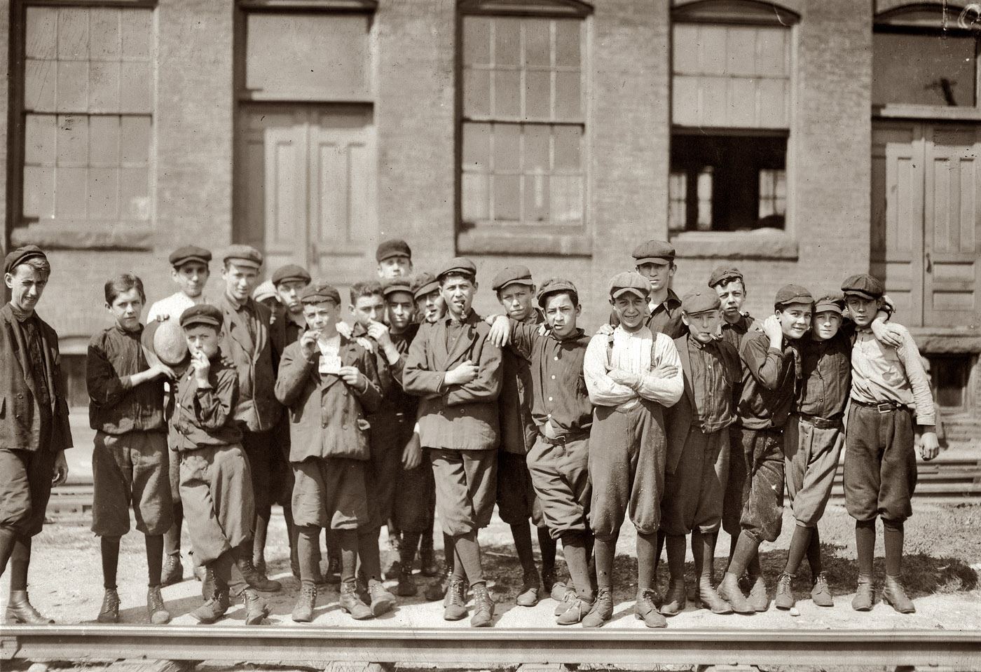 September 1911. Group in front of Indian Orchard Mfg. Co. Indian Orchard, Massachusetts. September 1911. View full size. Photo by Lewis Wickes Hine.