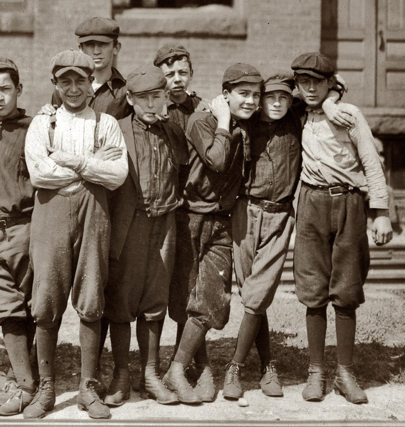 Group in front of Indian Orchard Mfg. Co. Everyone in public was working. Indian Orchard, Massachusetts. September 1911. Uncropped full image.