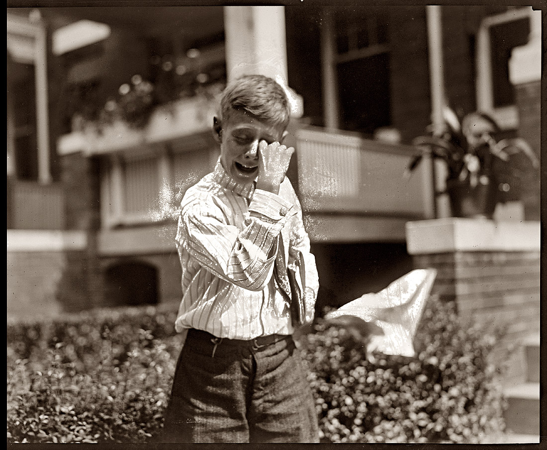 "Boy Crying (1920)" is all the caption card has to say about this enigmatic scene. Cheer up, Bub. View full size. National Photo Company Collection.