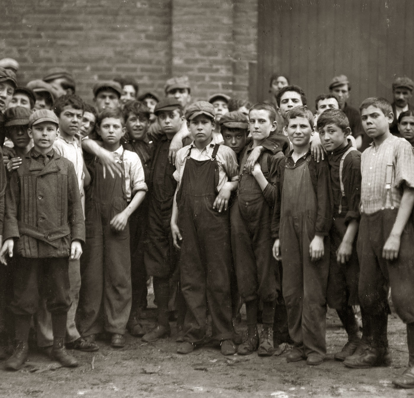 Young workers at a Lawrence, Massachusetts, manufacturing concern (fabric mill or cannery). September 1911. View full size. Photograph by Lewis Wickes Hine.