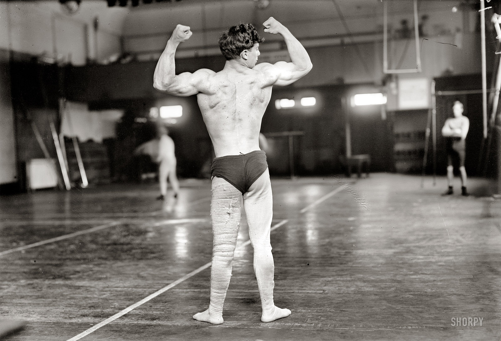 New York City circa 1908. "Sam Kramer." Bodybuilder and wrestler. 5x7 glass negative, George Grantham Bain Collection. View full size.