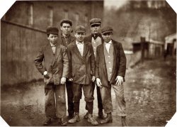 November 1911. Chicopee, Mass. Stanislaus Matthew, 30 Cabot Street (lefthand boy). Warren Butman, Nonotuck Street. Has worked in spinning room at Dwight Manufacturing since Monday. View full size. Photo by Lewis Wickes Hine.
