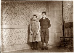 January 1912. "Veronica Mikula, says 12 years old, 93 N. Front Street. Steven Mikula (works in mill) says 15 years. Photo taken in spare unused room too cold to warm. They crowd together in kitchen. New Bedford, Massachusetts." View full size. Photograph and caption by Lewis Wickes Hine.
Lead on these people1920 census:  Providence, Rhode Island 5 Dryden Lane
Josephine Mikula  	54  Galicia
Stevens Mikula  	22  Galicia
Veronika Mikula 	18  Galicia
WWII card for Steven M. Mikula shows:
102 Charlstone Ave., Providence, RI
born 27 Aug 1896 Austria
"Always know your address" is listed as
Mrs. Veronica J. Floody  83 Jefferson St.
Locksmith, selfemployed
(The Gallery, Kids, Lewis Hine)