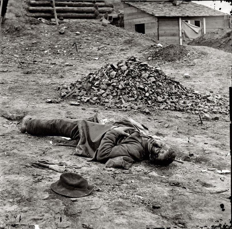 April 1865. Petersburg, Virginia. "Dead Federal soldier." Wet plate glass negative, right half of stereo pair, by Thomas Roche. Library of Congress. View full size.
