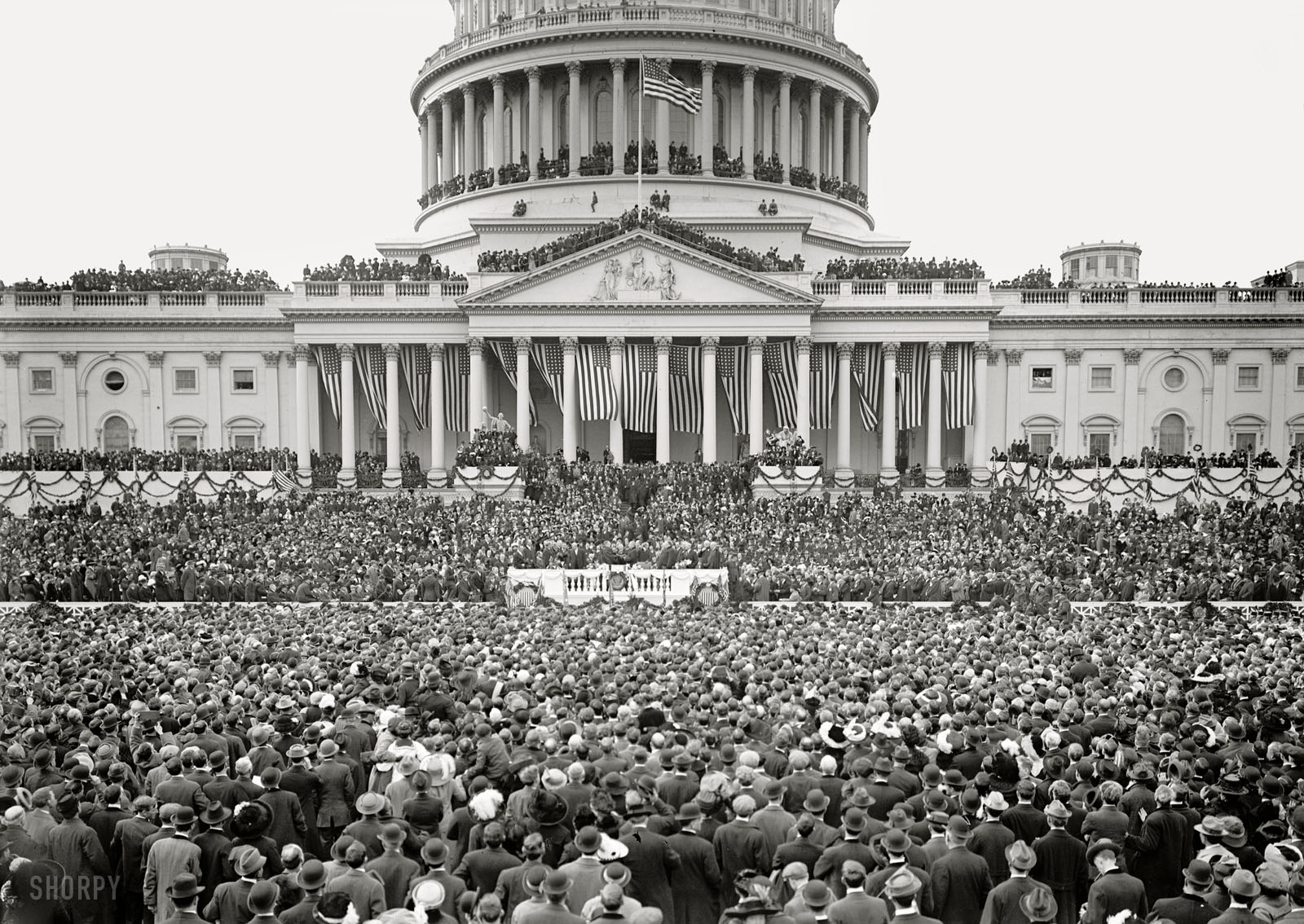 March 4, 1913. "Inaugural ceremony, East Front of Capitol." Woodrow Wilson being sworn in as 28th president of the United States. View full size.