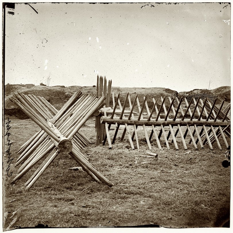 1865. "Petersburg, Virginia. Sections of chevaux-de-frise before Confederate main works." From photographs of the main Eastern theater of war, the siege of Petersburg, June 1864-April 1865. Glass plate negative, left half of stereograph pair, from Civil War photos compiled by Milhollen and Mugridge. View full size.