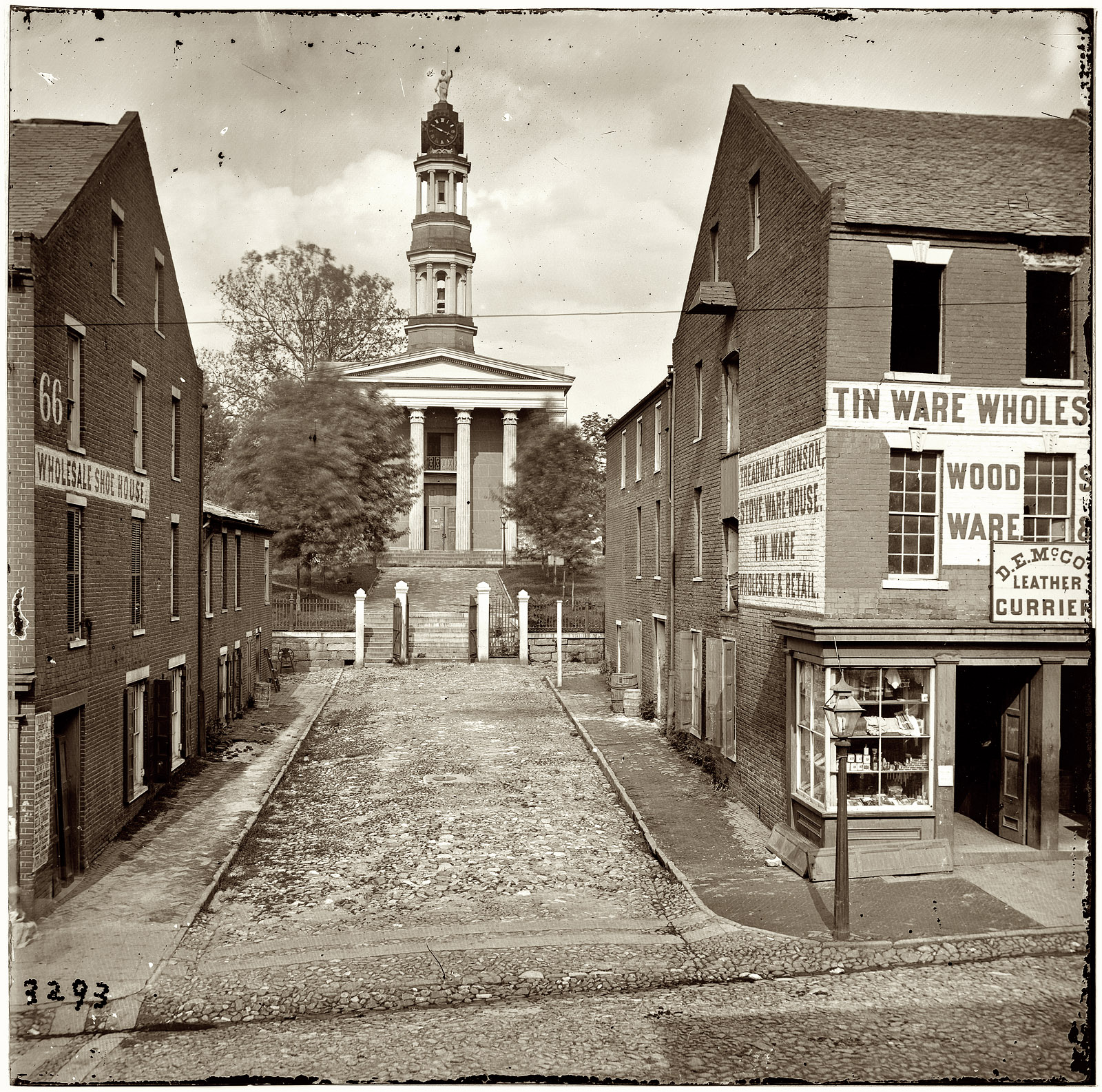 The Petersburg, Virginia, courthouse in 1865. From photographs of the main Eastern theater of war, the siege of Petersburg, June 1864-April 1865. Glass plate negative, right half of stereograph pair. Photographer unknown. View full size.
