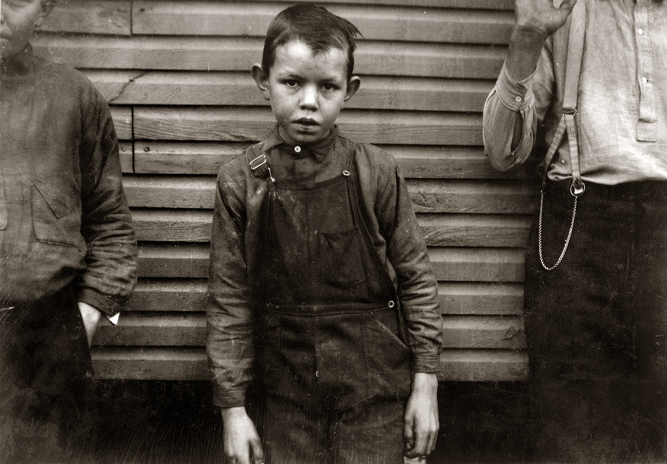 November 1913. Huntsville, Alabama. "Pete Henson, 414 C Street. Mother said he was 12 two months ago, but has been sweeping in the Merrimack Mill for seven months, so he began at 11 years. Brother Edward said to be 13 years, but doubtful. Mother said they had no Family Record here and gave me ages from memory." Photograph and caption by Lewis Wickes Hine. View full size.