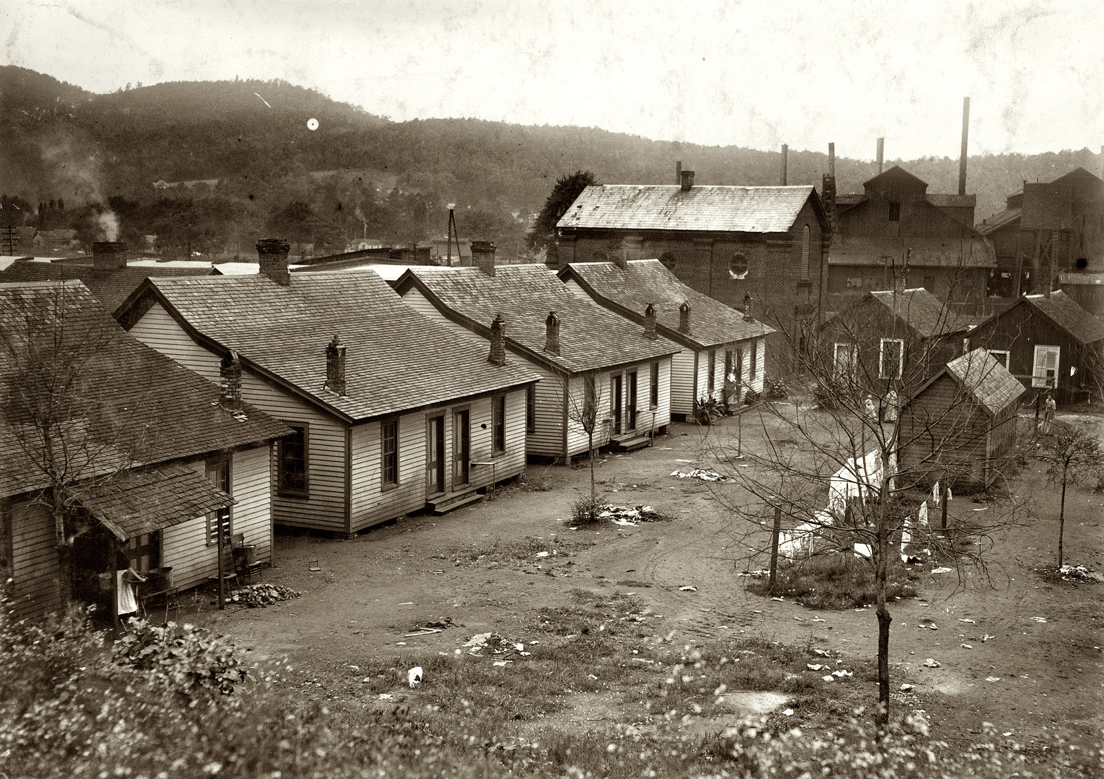 October 1914. Anniston, Alabama. "Housing conditions at Adelaide Mill. The village is run down and greatly in need of sanitary improvements." Photograph and caption by Lewis Wickes Hine. View full size.
