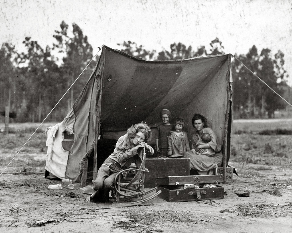 A migrant mother, 32, who has seven hungry children, living in a tent camp in Nipomo, California. Photograph by Dorothea Lange, March 1936. View full size.

The mother in this photo is the famous subject of a Depression-era portrait known as "Migrant Mother." She came forward in the late 1970s and was revealed to be Florence Owens Thompson. She died in 1983. You can see the photo and read more here.