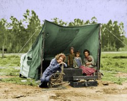 This is a colorized version of Mother and Children in Tent Camp: 1936. View full size.