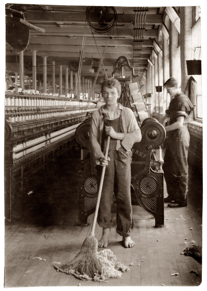 15-year-old sweeper in the spinning and spooling room of Berkshire Cotton Mills. Adams, Massachusetts. July 10, 1916. View full size. Photo by Lewis Hine.