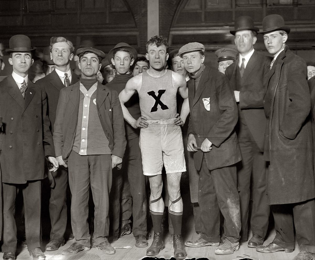 February 12, 1909. "James Clarke, winner of Brooklyn Marathon, with others." View full size. 5x7 glass negative, George Grantham Bain Collection.