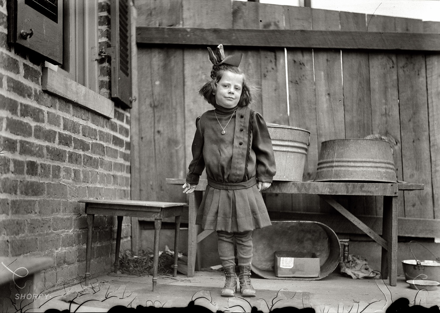 Washington, 1913. "Dr. Freedman -- Children cured by his cure." Regardless of what the story is here (and I have high hopes that we'll find out), this girl looks like a real piece of work. Harris & Ewing Collection glass negative. View full size.