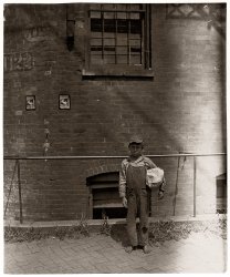 August 1908. Cincinnati, Ohio. "Bundle carrier Sidney Ashcraft, 10 years old, 517 Hannibal Street North." Photo by Lewis Wickes Hine. View full size.