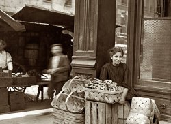 Cincinnati, August 1908. "Lena Lochiavo, 11 years old, 209 West Sixth Street. Basket [and pretzel] seller at Sixth Street Market in front of saloon entrance." Photo by Lewis Wickes Hine. View full size.