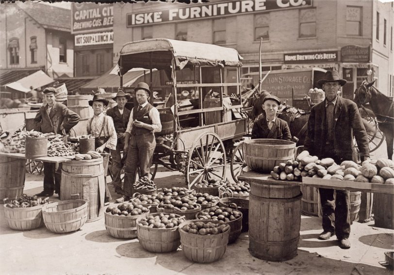 Indianapolis Market. August 1908. Wit., E. N. Clopper. People shopped at open-air markets like this for fresh produce before the advent of the supermarket, which was basically a self-service farmers market, butcher shop and dry goods store all under one roof. View full size.
