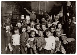 Indianapolis newsboys waiting for the Base Ball edition, in a newspaper office. August 1908. View full size. Photograph by Lewis Wickes Hine.