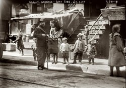 An organ grinder on the streets of New York's Lower East Side circa 1910. 5x7 glass negative, George Grantham Bain Collection. View full size.