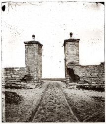 Wagon tracks and gate in St. Augustine, Florida, circa 1865. View full size. Left half of a wet-collodion glass-plate stereograph made by Samuel A. Cooley.
