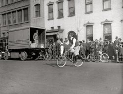 January 29, 1921. Washington, D.C. "Herbert Bell and Joe Garso." The one-legged trick bike riders put on a show. National Photo glass negative. View full size.