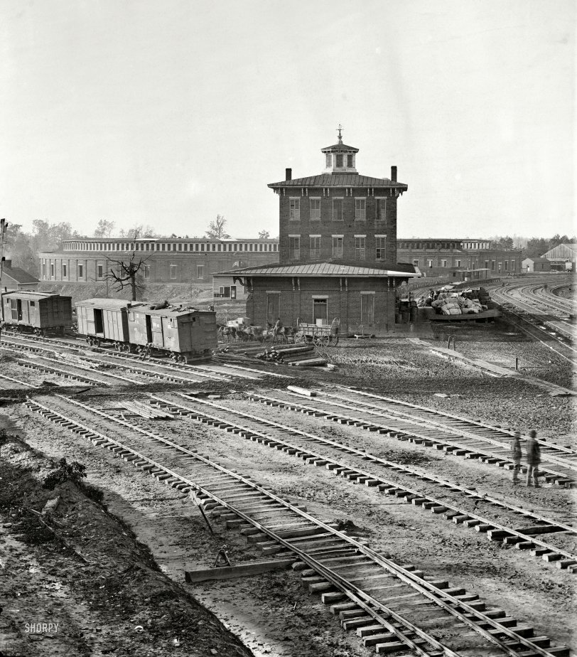 November 1864. "Railroad yards at Atlanta. The Roundhouse. Ruins of depot, blown up on Sherman's departure." Wet plate glass negative by George N. Barnard. Civil War glass negative collection, Library of Congress. View full size.
