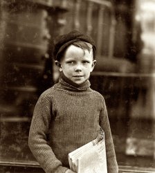 May 1910. St. Louis, Missouri. "Boy named Gurley. An eight year old newsie. 18th & Washington Streets." View full size. Photograph by Lewis Wickes Hine.