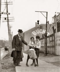St. Louis, May 1910. N. Broadway and De Soto. "Boy with the bag, nicknamed Turk, said he was going to Texas soon. The investigator found him recently with $1.75 he had just won at craps." Photo by Lewis Wickes Hine. View full size.