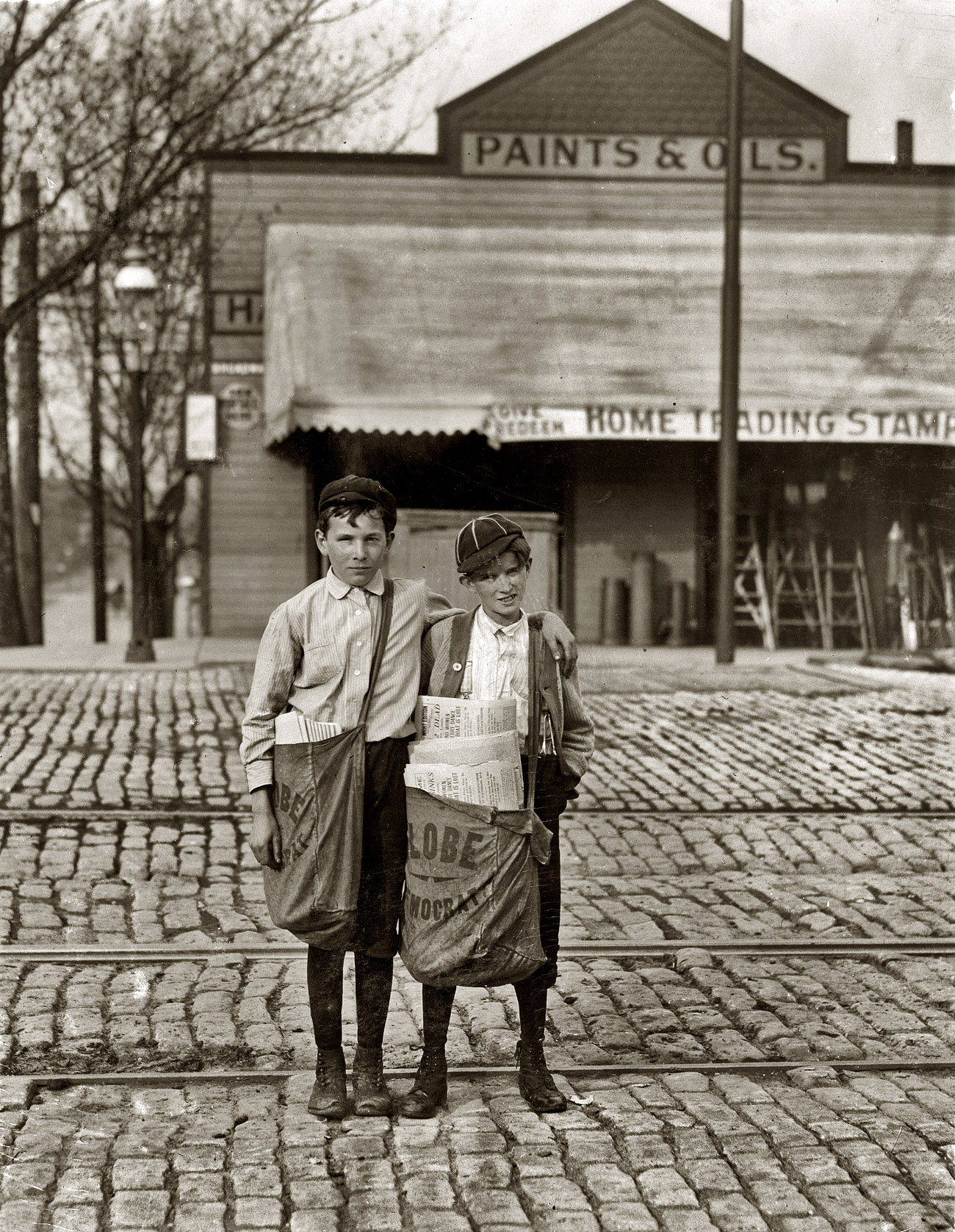 St. Louis, May 1910. "The boy on the right, nicknamed Turk, said he was going to Texas soon. The investigator found him recently with $1.75 he had just won at craps." The same boys seen here. Photo by Lewis Wickes Hine. View full size.