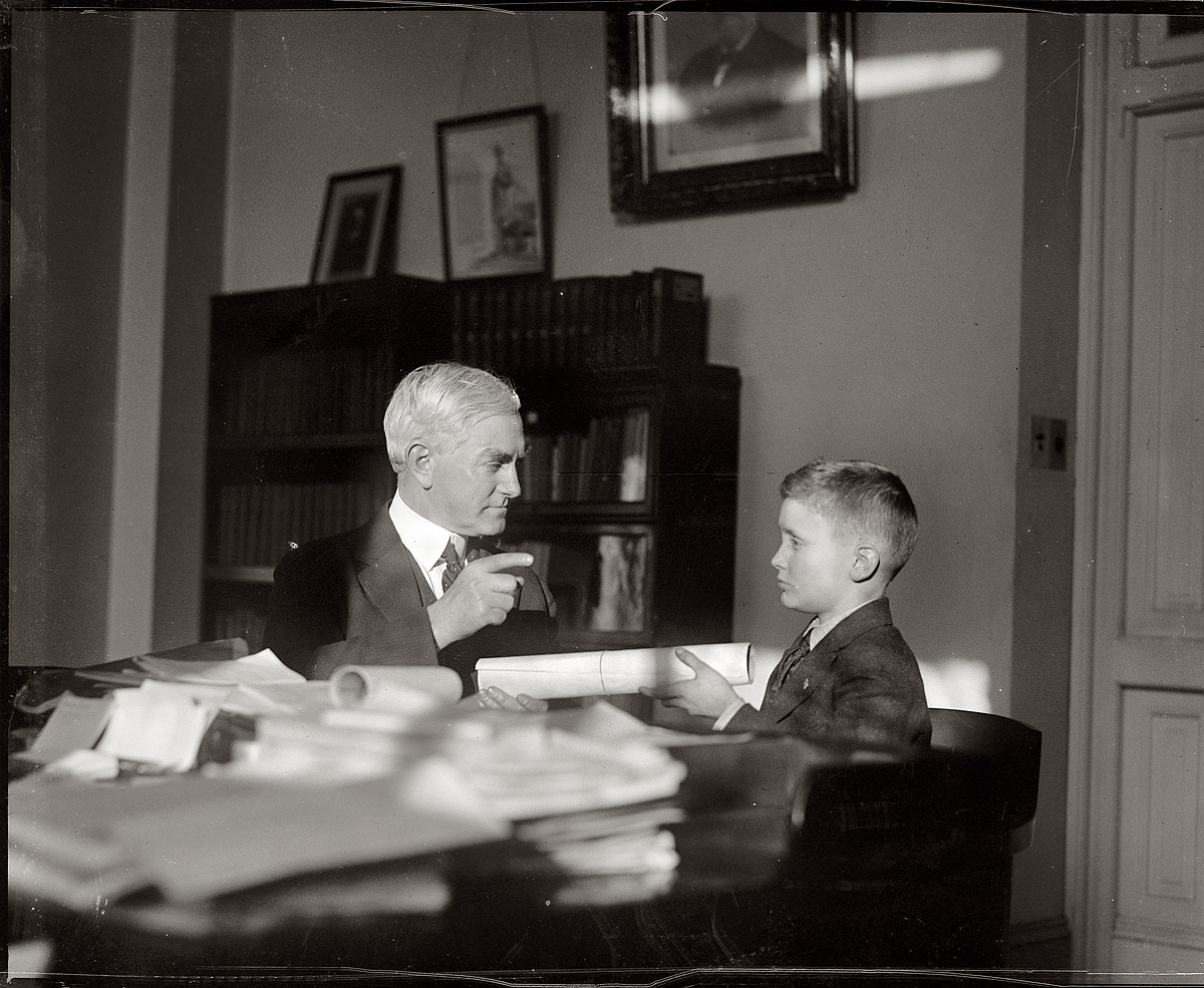 "Edwards boy and P.P. Claxton." Our mysterious lad continues his tour of Washington in early 1921 with a visit to the offices of the federal commissioner of education, Philander P. Claxton. View full size. National Photo Co. Collection.