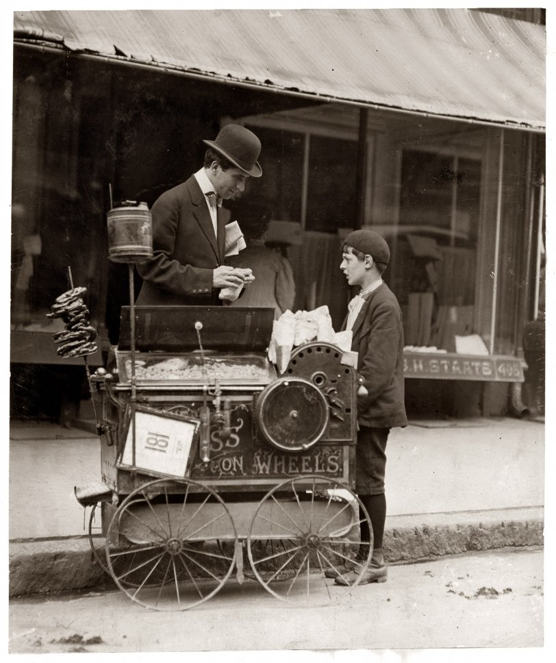 May 21, 1910. "Joseph Severio, Peanut Vendor. Wilmington, Delaware. 11 years of age. Pushing cart 2 years. Out after midnight. Ordinarily works 6 hours per day. Works of own volition. Doesn't smoke. All earnings go to father." Photograph by Lewis Wickes Hine. View full size.