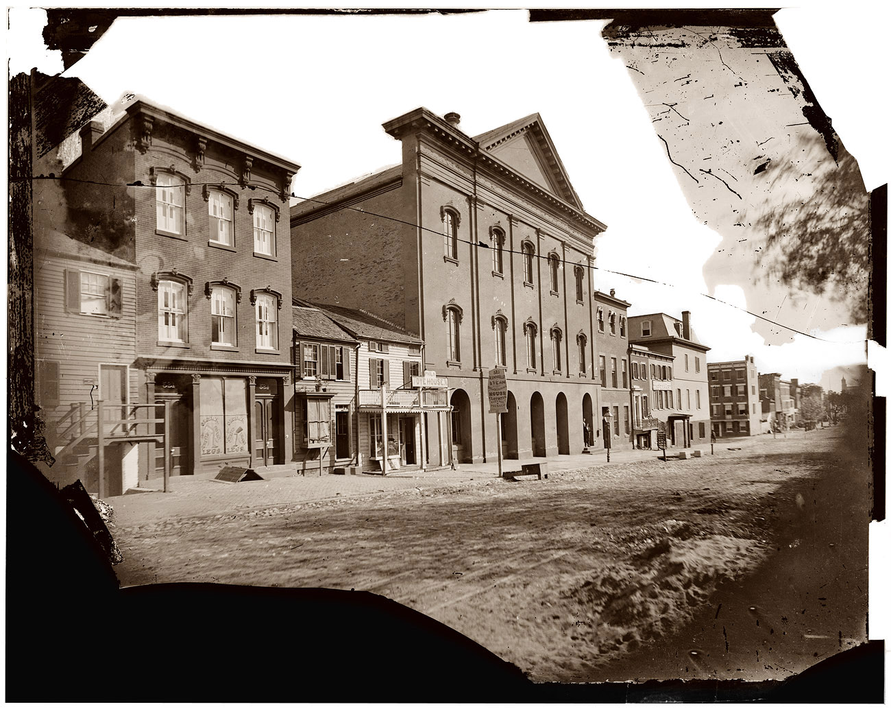 Old Ford's Theatre in Washington, D.C., where Abraham Lincoln was shot in 1865. View full size. Wet collodion glass plate. Photograph by Mathew Brady.