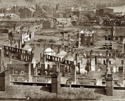 Richmond, April 1865. Partial view of the burned district. From photographs of the main Eastern theater of war and fallen Richmond compiled by Hirst Milhollen and Donald Mugridge. Detail of wet-plate glass negative. View full size | More.