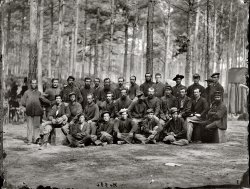 August 1864. Petersburg, Virginia. "Essayons Dramatic Club, a group of the U.S. Engineer Battalion." From photos of the main Eastern theater of war, the siege of Petersburg. Wet plate glass negative, photographer unknown. View full size.

From the Army Corps of Engineers Web site: For more than a century the Corps of Engineers had its own drama club. The Essayons Dramatic Club, one of the oldest amateur theatrical production companies in the U.S., was founded Jan. 27, 1864 by the Engineer Battalion, then serving with the Army of the Potomac and wintering at Brandy Station, Va. The battalion built a small theater and organized an orchestra, and Feb. 26 the troupe presented "Toodles," its first play.