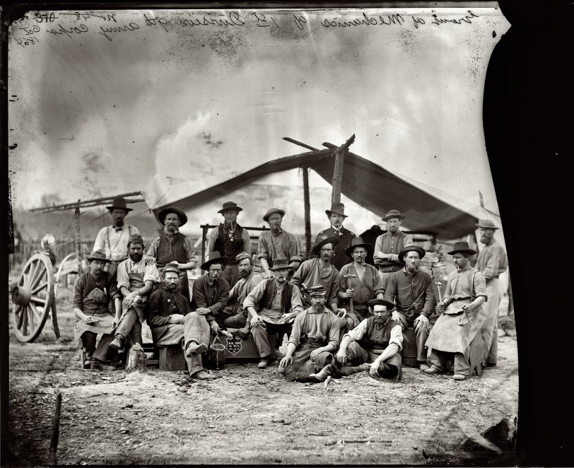 October 1864. Petersburg, Virginia. "Mechanics of 1st Division, 9th Army Corps." Wet plate glass negative, photographer unknown. View full size.