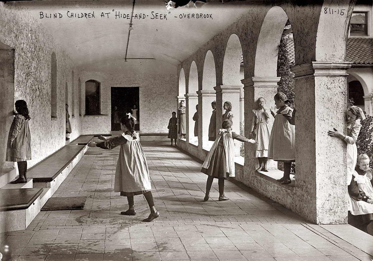 "Blind children playing hide-and-seek among arcade pillars" at the Overbrook School in Philadelphia ca. 1912. View full size. Geo. Grantham Bain Collection.