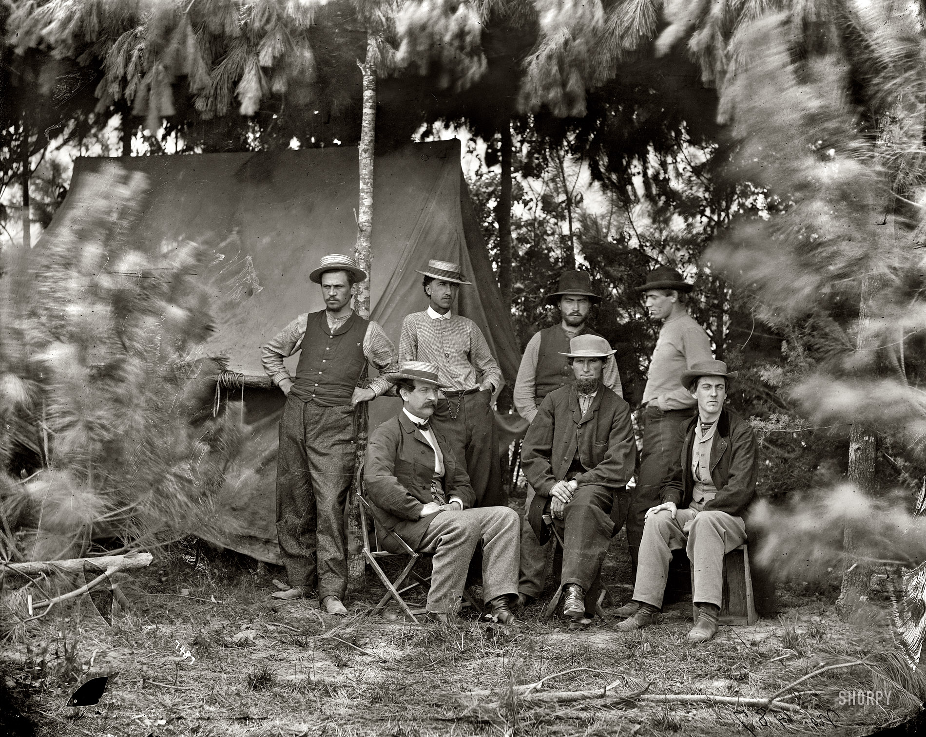 1864. Petersburg, Virginia. "Maj. Thomas T. Eckert (seated, left) and others of U.S. Military Telegraph Corps." Wet plate glass negative. View full size.