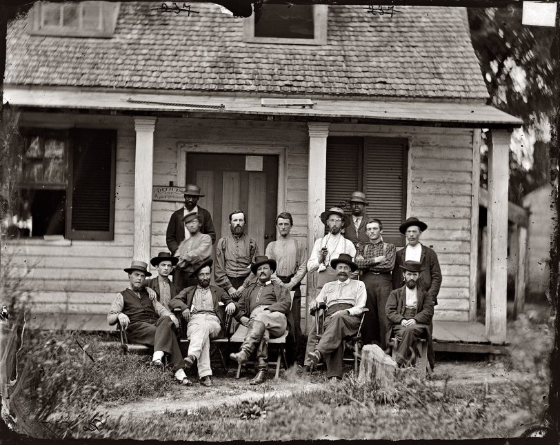 August 1864. "Petersburg, North Carolina. Group at headquarters of the Provost Marshal Department." View full size. Wet collodion glass-plate negative, LOC.
