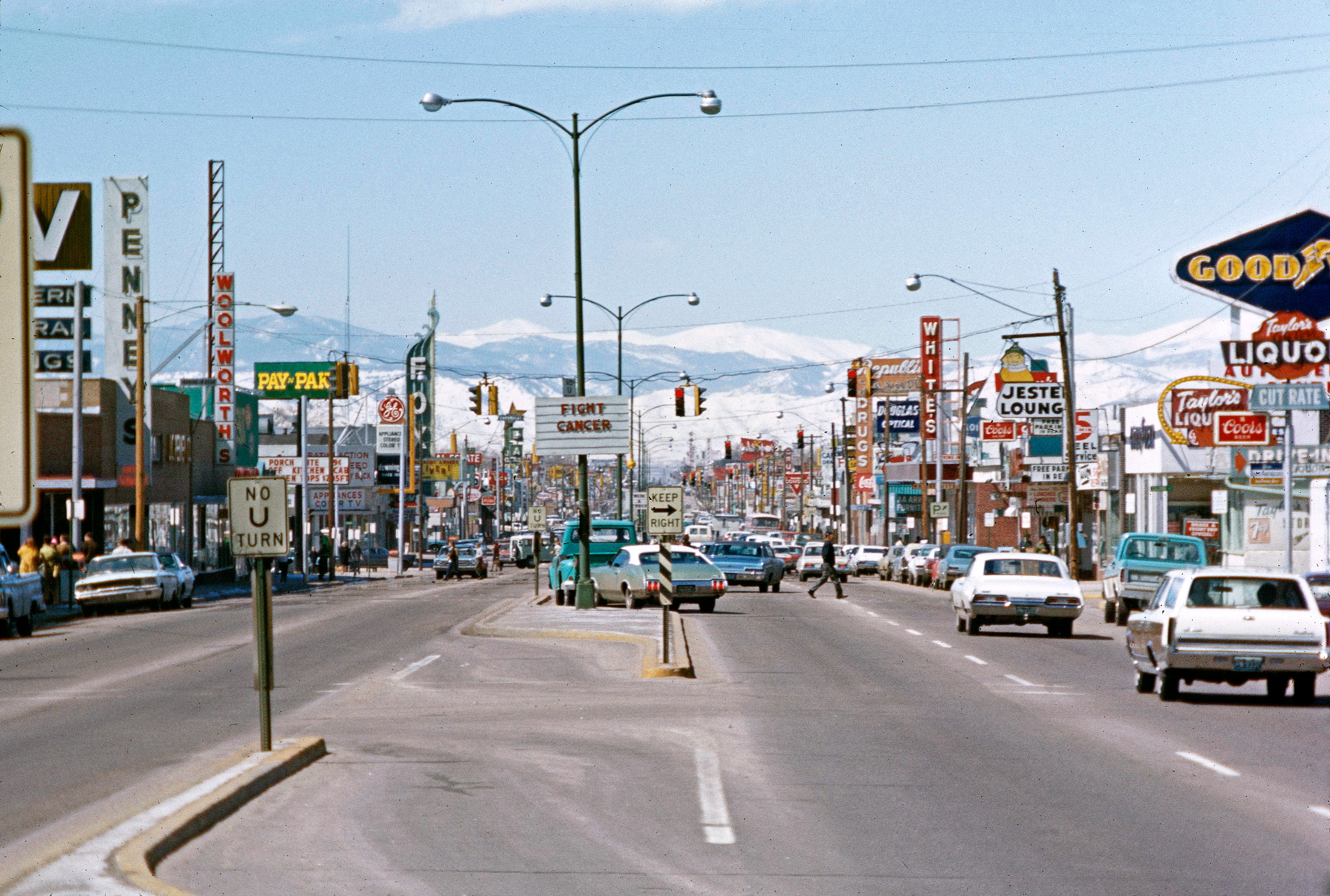 Colfax Avenue in Aurora, Colorado, about 1971. We lived there briefly while my dad was serving in the Air Force at Lowry AFB in Denver. I wish the image was a bit crisper, however, this is remarkable to me mainly for how starkly different it looks today, and how chaotic it looked back in the day. View full size.