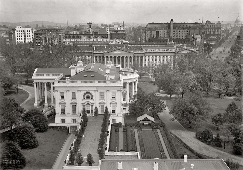1914. "White House tent in Rose Garden." A view of the executive mansion from over the West Wing looking east past the Treasury and along Pennsylvania Avenue to the Capitol. Harris &amp; Ewing Collection glass negative. View full size.
