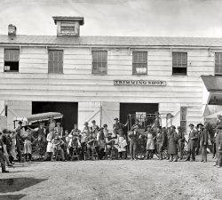 April 1865. Washington, D.C. "Workmen in front of the Government [Wagon] Trimming Shop." Civil War archive, wet plate glass negative. View full size.