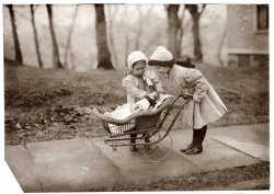 Children playing with Campbell Kid dolls. New York City, March 1912.  View full size. Photograph by Lewis Wickes Hine.